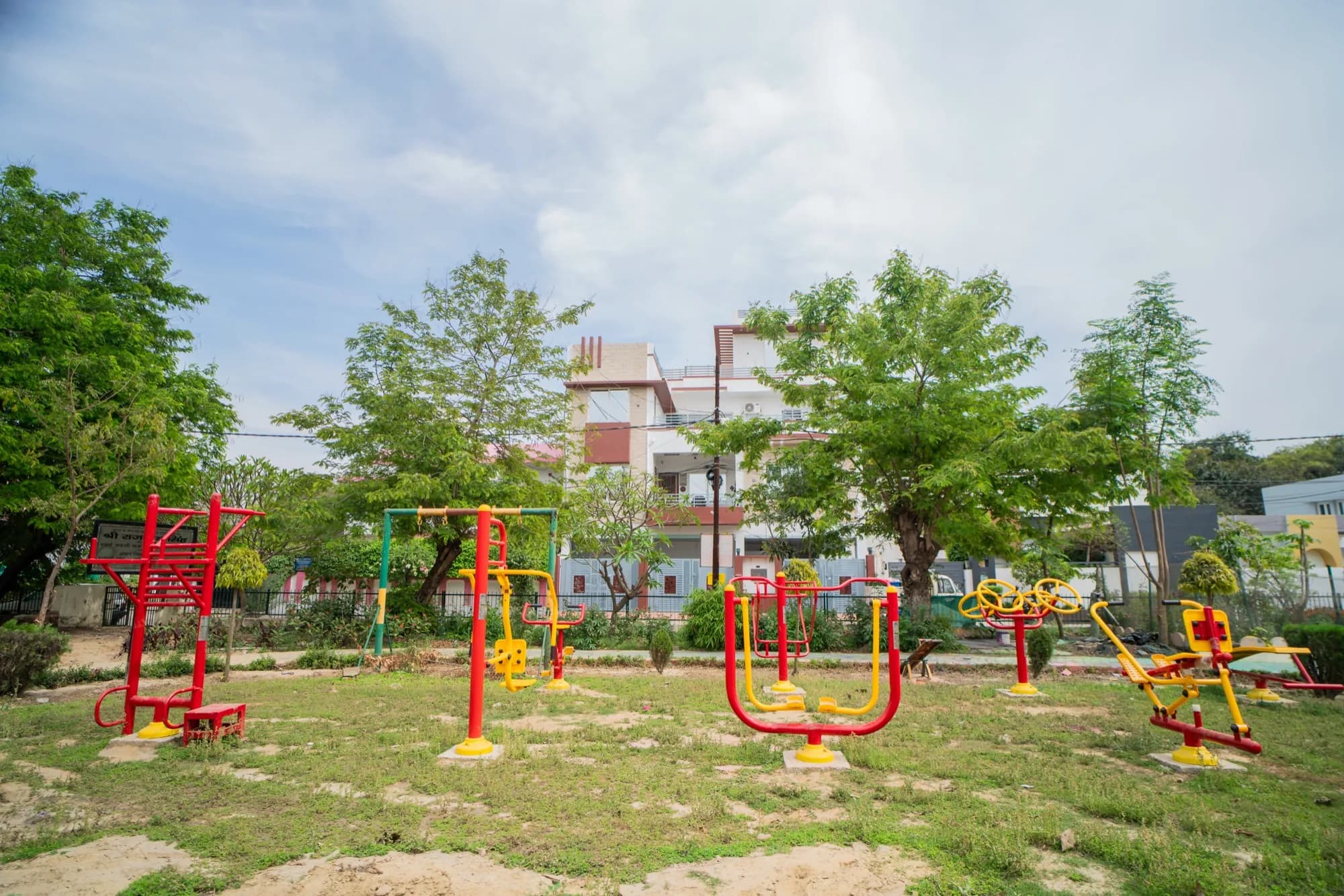 The park near the house, with outdoor exercise equipment